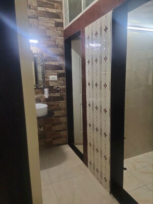 Building Lobby in 2 BHK Apartment at Atria Dhanashree Aangan, Undri – for Rent
