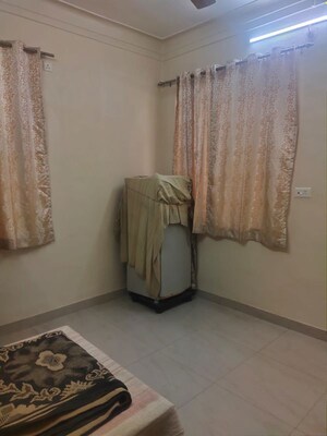 Living Room in 2 BHK Apartment at Atria Dhanashree Aangan, Undri – for Rent