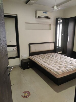 Bedroom in 2 BHK Apartment at Blue Mountains, Malad East – for Rent