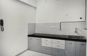 Kitchen in 2 BHK Apartment at Kolte Patil R10, Hinjewadi – for Rent