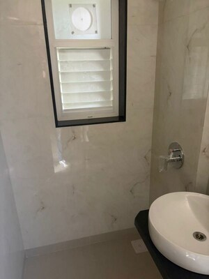 Bathroom in 1 BHK Apartment at MICL Aaradhya Parkwood, Mira Road – for Rent