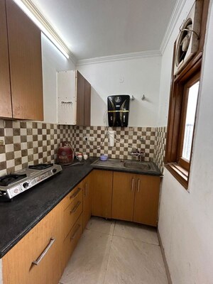 Kitchen in 2 BHK Builder Floor at Freedom Fighters Enclave – for Rent