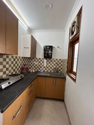 Kitchen in 2 BHK Builder Floor at Freedom Fighters Enclave – for Rent