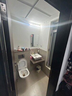 Bathroom in 1 BHK Apartment at Piramal Revanta, Mulund West – for Rent