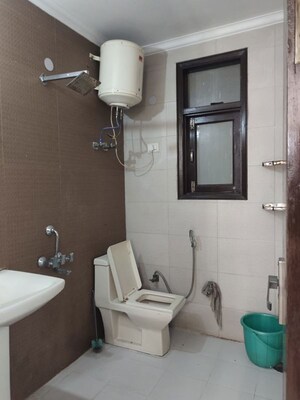 Bathroom in 3 BHK Builder Floor at Freedom Fighters Enclave – for Rent