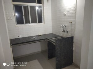 Kitchen in 1 BHK Apartment at Nirvana Lifecity, Lohgaon – for Rent
