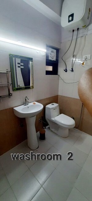 Bathroom in 2 BHK Apartment at SVP Gulmohur Garden, Raj Nagar Extension – for Rent