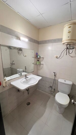 Bathroom in 3 BHK Apartment at Kosmos Heights, Sector 134 – for Rent