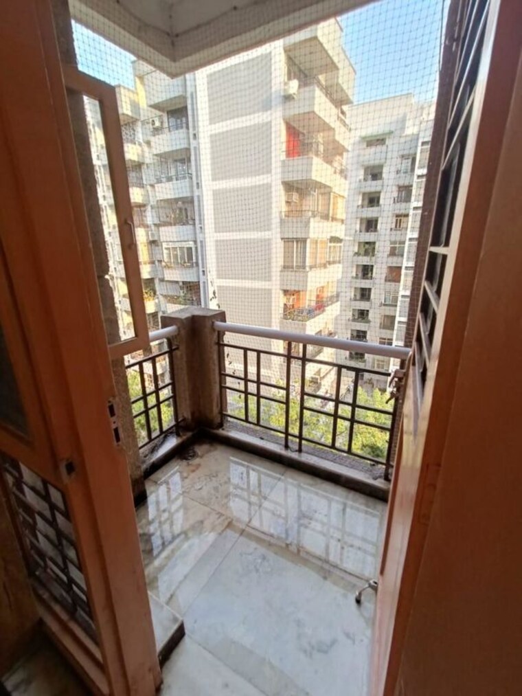 Balcony, kosmos-heights 2 Bedroom 950 Sq.Ft. Apartment In Sector 134 Noida 10645402