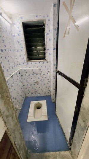 Bathroom in 2 BHK Apartment at Om Shree Vrindavan CHS, Mira Road – for Rent