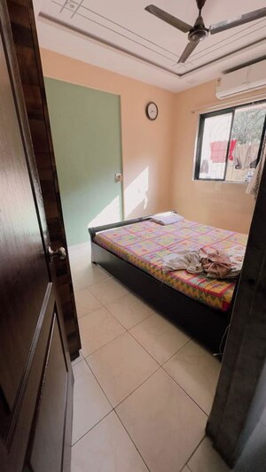 Bedroom in 2 BHK Apartment at Om Shree Vrindavan CHS, Mira Road – for Rent