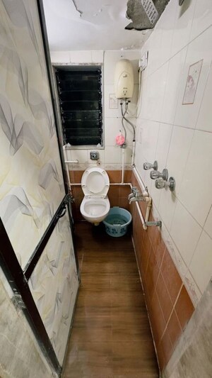 Bathroom in 2 BHK Apartment at Om Shree Vrindavan CHS, Mira Road – for Rent