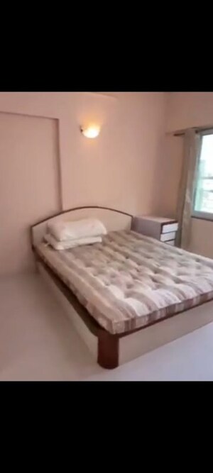Bedroom in 2 BHK Apartment at Anuradha CHS, Vile Parle West – for Rent