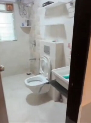 Bathroom in 2 BHK Apartment at Anuradha CHS, Vile Parle West – for Rent