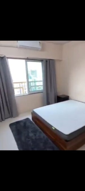 Bedroom in 2 BHK Apartment at Anuradha CHS, Vile Parle West – for Rent