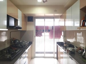 Kitchen in 3 BHK Apartment at Courtyard by Narang Realty and The Wadhwa Group, Pokhran Road No Two – for Sale