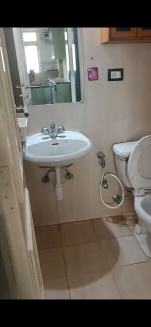 Bathroom in 2 BHK Apartment at Hiranandani Estate Winona, Ghodbunder Road – for Rent