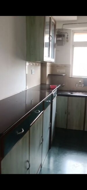 Kitchen in 2 BHK Apartment at Hiranandani Estate Winona, Ghodbunder Road – for Rent