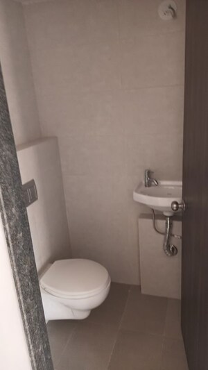 Bathroom in 1 BHK Apartment at Damji Shamji Mahavir Spring Tulip Phase 1, Pokhran Road No Two – for Rent