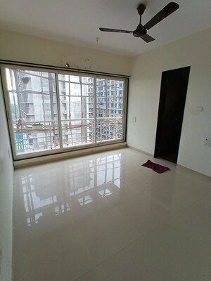 Room in 2 BHK Apartment at Lokhandwala Spring Grove, Kandivali East – for Sale