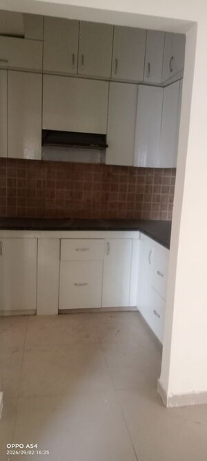 Kitchen in 3 BHK Apartment at Mahagun Mywoods, Sector 16c Greater Noida – for Rent