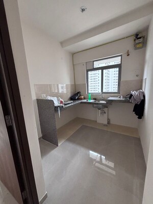 Kitchen in 1 BHK Apartment at Piramal Vaikunth, Balkum Pada – for Rent