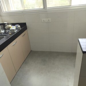Kitchen in 2 BHK Apartment at Sharada Alliance Paritosh, Balewadi – for Rent