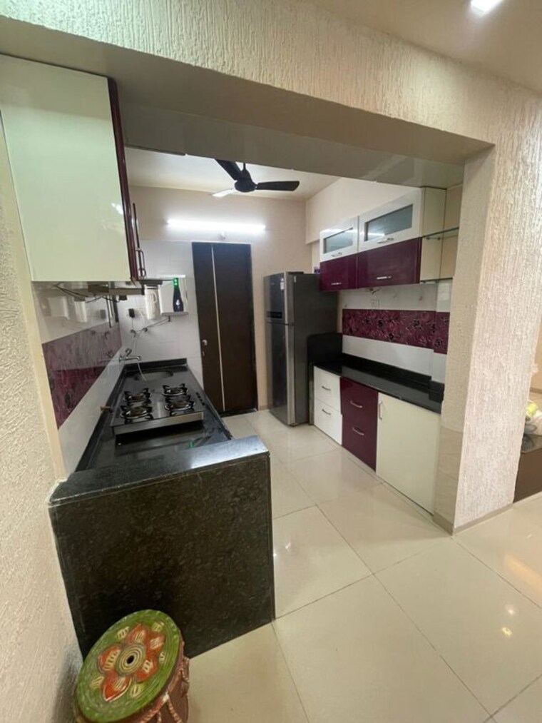 Kitchen, karan-sara 2 Bedroom 900 Sq.Ft. Apartment In Baner Pune 10645982