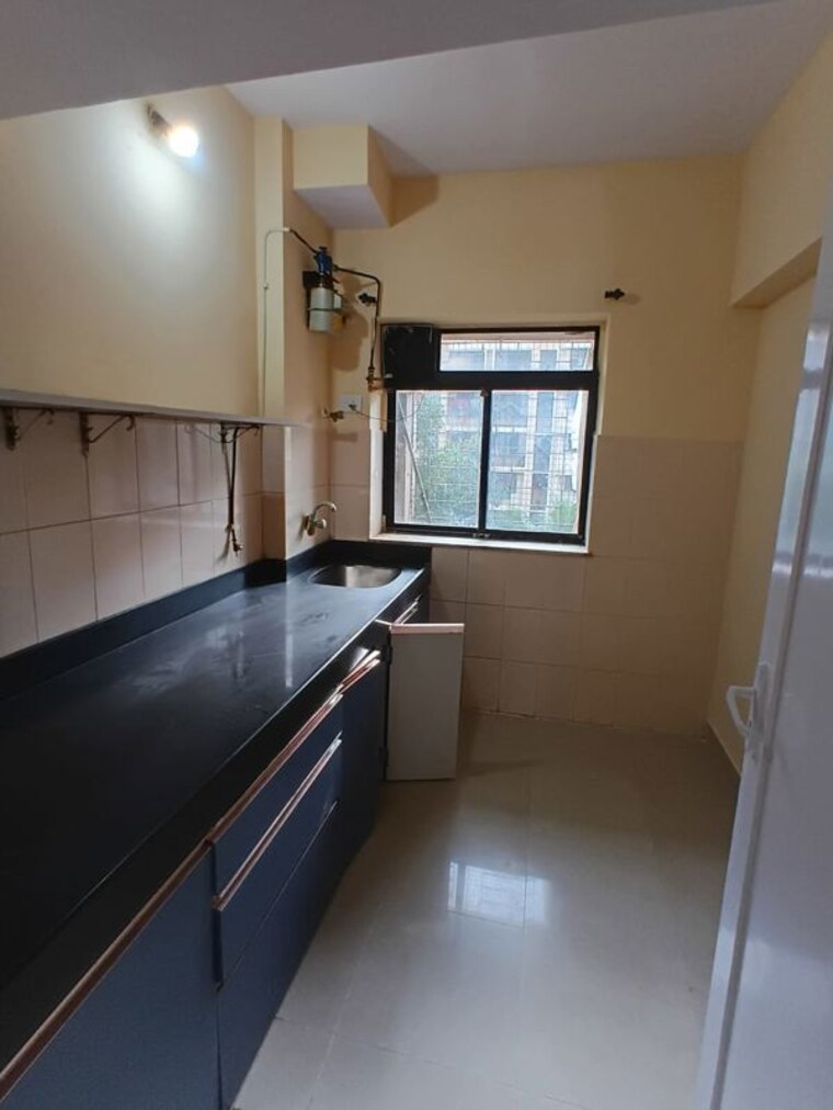 Kitchen, lokhandwala-infrastructure-spring-leaf 2 Bedroom 650 Sq.Ft. Apartment In Kandivali East Mumbai 10645993