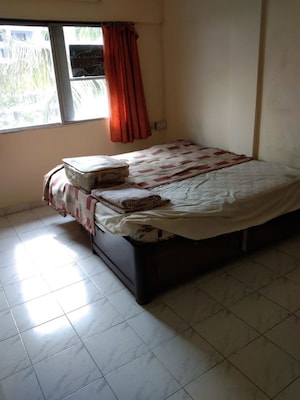 Bedroom in 2 BHK Apartment at Damodar Villa, Kothrud – for Rent