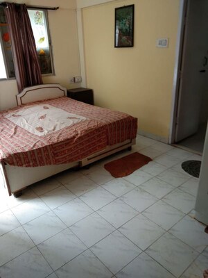 Bedroom in 2 BHK Apartment at Damodar Villa, Kothrud – for Rent