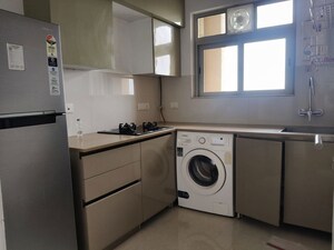 Kitchen in 1 BHK Apartment at Hiranandani The Walk, Ghodbunder Road – for Rent