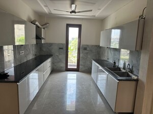Kitchen in 3 BHK Builder Floor at Ansal Esencia-Mulberry Homes, Sector 67 – for Rent