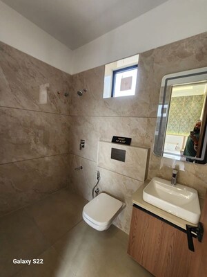Bathroom in 4 BHK Apartment at Courtyard Bellavista, Bhayli – for Sale
