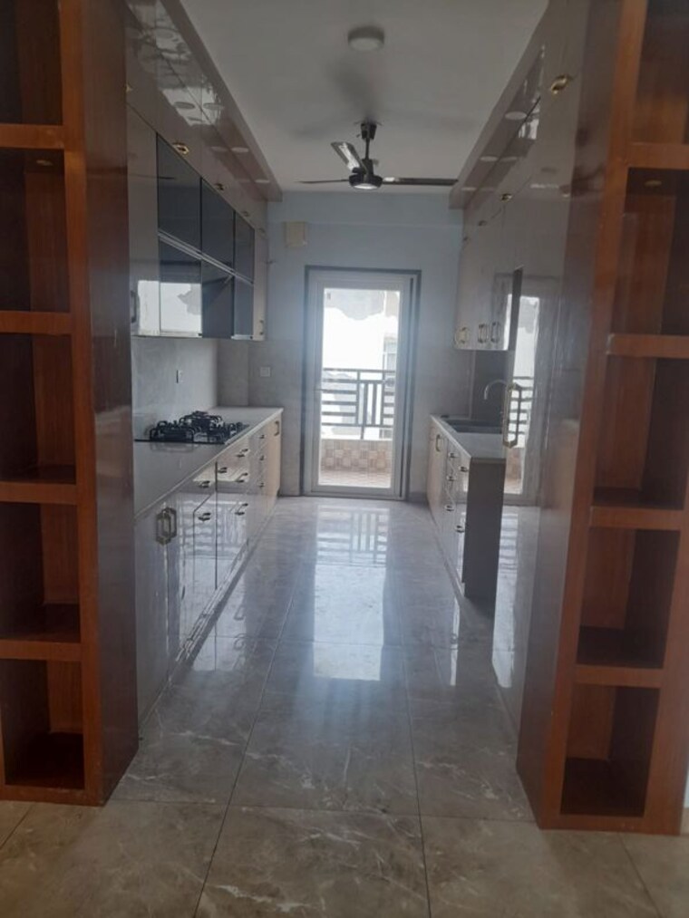 Kitchen, ansal-esencia-amara-villas 3 Bedroom 2200 Sq.Ft. Apartment In Sector 67 Gurgaon 10646236