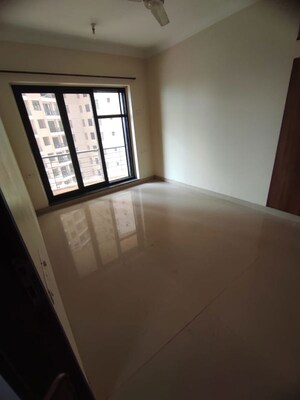 Room in 2 BHK Apartment at K Raheja Heights, Malad East – for Rent