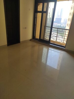 Living Room in 2 BHK Apartment at K Raheja Heights, Malad East – for Rent