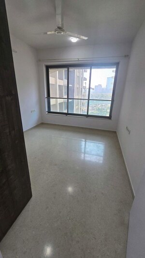 Room in 2 BHK Apartment at Kalpataru Aura, Ghatkopar West – for Rent