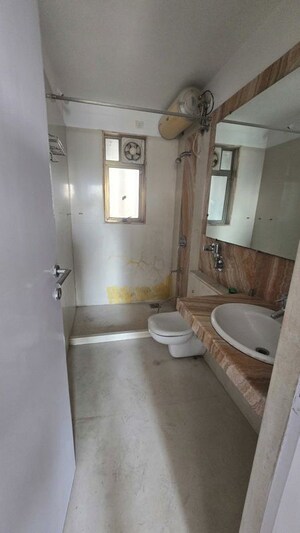 Bathroom in 2 BHK Apartment at Kalpataru Aura, Ghatkopar West – for Rent