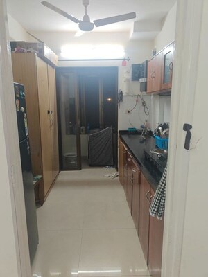 Kitchen in 2 BHK Apartment at Greenwoods CHS, Andheri East – for Rent