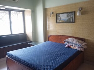 Bedroom in 2 BHK Apartment at Satellite Garden, Goregaon East – for Rent