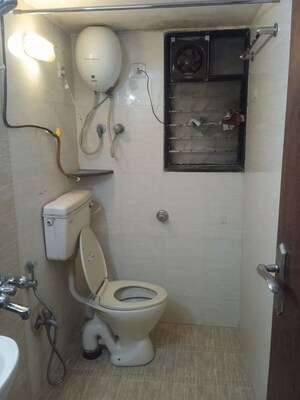 Bathroom in 2 BHK Apartment at Satellite Garden, Goregaon East – for Rent