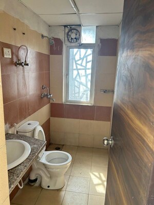 Bathroom in  Apartment at Mahagun My Woods, Sector 16c Greater Noida – for Rent