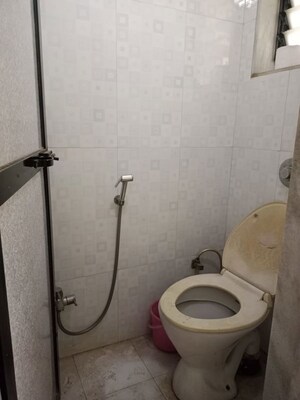 Bathroom in 2 BHK Apartment at Daya Sarita, Gokuldham Colony – for Rent