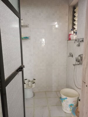 Bathroom in 2 BHK Apartment at Daya Sarita, Gokuldham Colony – for Rent