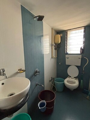 Bathroom in 2 BHK Apartment at Kalash Kumkum Darshan, Vasai East – for Rent