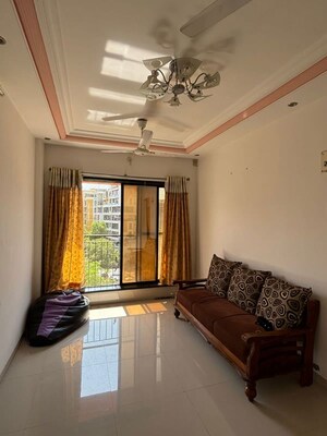 Living Room in 2 BHK Apartment at Kalash Kumkum Darshan, Vasai East – for Rent
