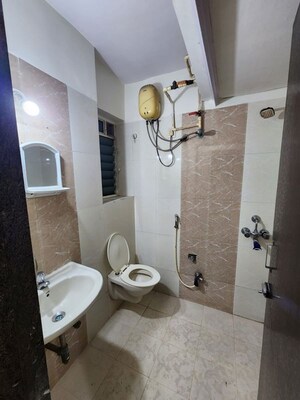 Bathroom in 2 BHK Apartment at Je And Vee Om Trimurti, Malad East – for Rent
