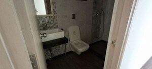 Bathroom in 3 BHK Apartment at Raj Infinia, Malad West – for Rent