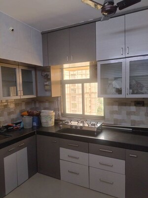 Kitchen in 2 BHK Apartment at Uma Sparta, Ghodbunder Road – for Rent